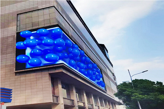 Outdoor corner naked eye 3D LED screen installed in a commercial complex in Oman
